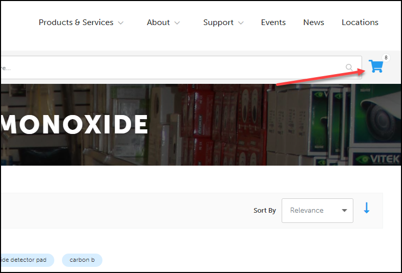 Close-up screenshot of online shopping page with cart indicated.