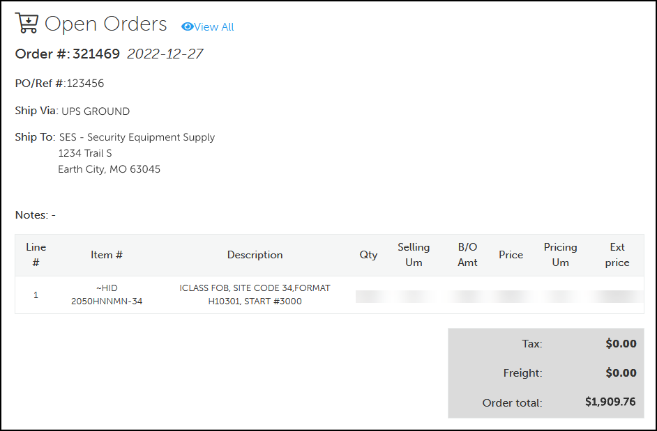 Screenshot of an open order, with purchase order number, ship via, shipping address, line items, prices, and order total.